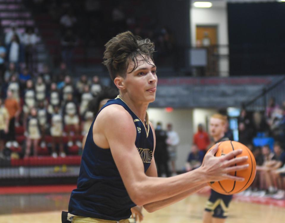 Jacksonville's Cade Phillips goes up for a dunk during the Class 4A North Regional final at Pete Mathews Coliseum on Wednesday, Feb. 23, 2022 in Jacksonville, Alabama.