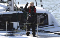 Climate activist Greta Thunberg waves as she arrives in Lisbon aboard the sailboat La Vagabonde Tuesday, Dec 3, 2019. Thunberg has arrived by catamaran in the port of Lisbon after a three-week voyage across the Atlantic Ocean from the United States. The Swedish teen sailed to the Portuguese capital before heading to neighboring Spain to attend the U.N. Climate Change Conference taking place in Madrid. (AP Photo/Pedro Rocha)