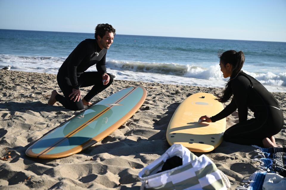 The Bachelor Joe Graziadei takes Jenn Tran, a 25-year-old physician assistant student from Miami, on a one-on-one surfing date. Tran received a rose on the date.