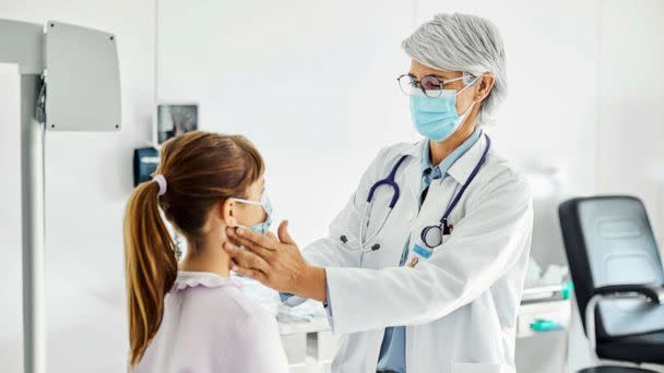 PHOTO: Stock photo of a doctor examining a patient. (STOCK PHOTO/Getty Images)