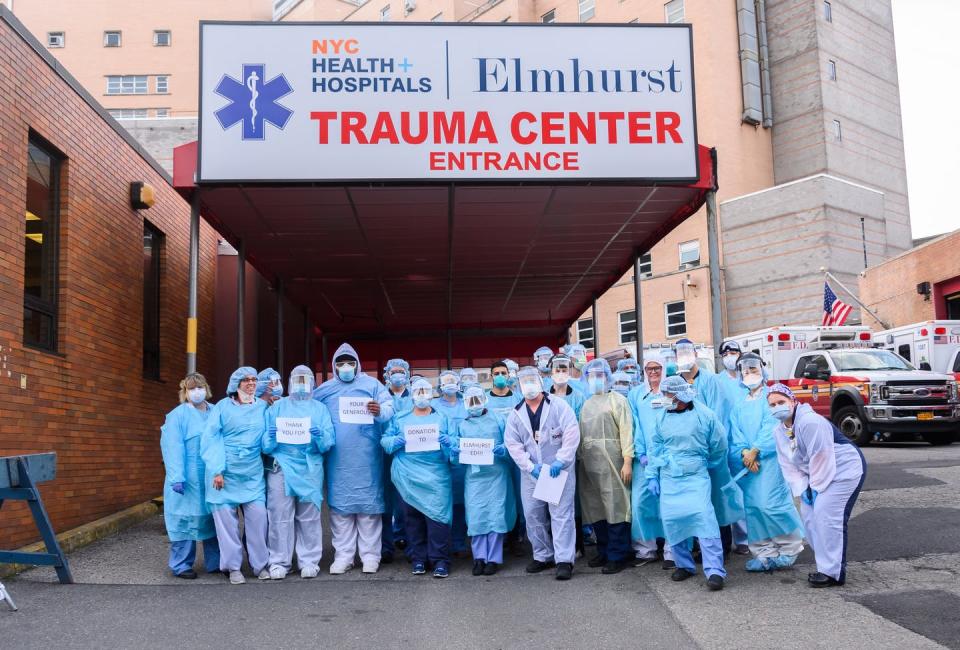 <span class="caption">Compassion and solidarity on display at New York’s Elmhurst Hospital, during the April peak of the city’s coronavirus outbreak.</span> <span class="attribution"><a class="link " href="https://www.gettyimages.com/detail/news-photo/medical-workers-pose-for-a-photo-with-thank-you-signs-news-photo/1220057734?adppopup=true" rel="nofollow noopener" target="_blank" data-ylk="slk:Noam Galai/Getty Images;elm:context_link;itc:0;sec:content-canvas">Noam Galai/Getty Images</a></span>