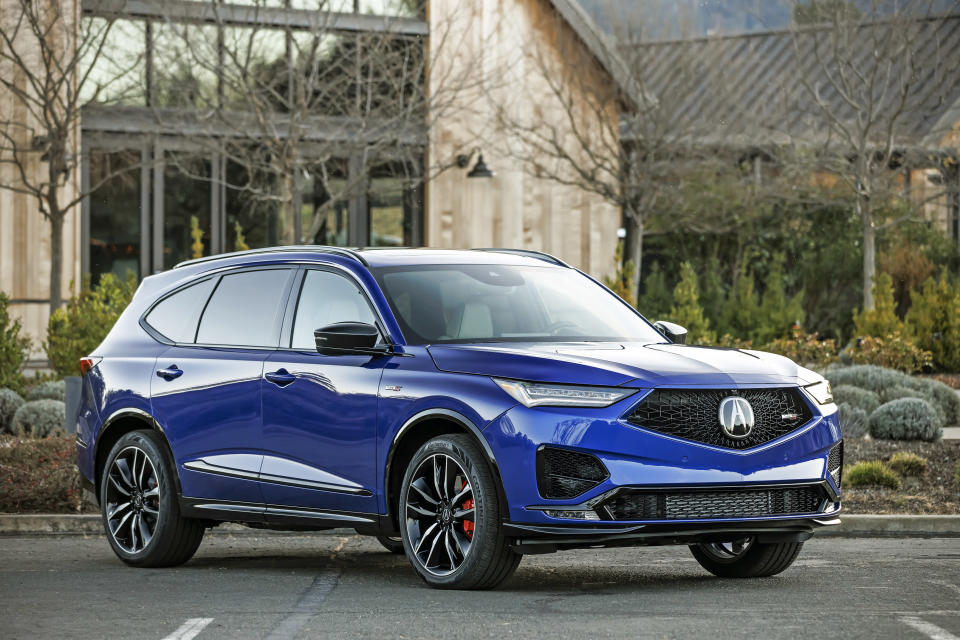 This photo provided by American Honda Motor Co. shows the 2022 Acura MDX, a midsize three-row luxury SUV that was recently redesigned. It has bolder looks and generous cargo capacity. (American Honda Motor Co. via AP)