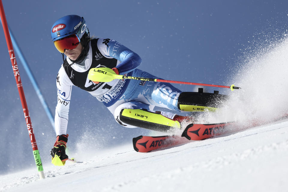 United States' Mikaela Shiffrin speeds down the course during the first run of the women's World Championship slalom, in Meribel, France, Saturday Feb. 18, 2023. (AP Photo/Gabriele Facciotti)