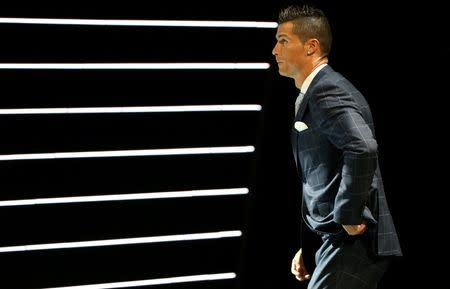 Real Madrid's Cristiano Ronaldo of Portugal arrives on the stage to receive The Best Player UEFA 2015/16 Award during the draw ceremony for the 2016/2017 Champions League Cup soccer competition at Monaco's Grimaldi in Monaco, August 25, 2016. REUTERS/Eric Gaillard