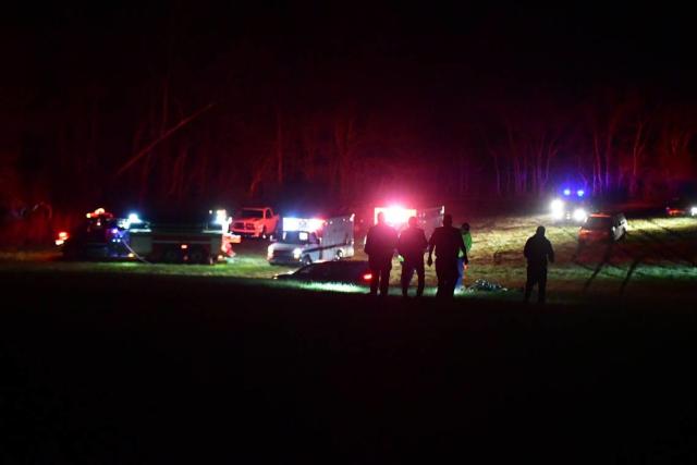 First responders assess the scene of a military helicopter crash in Trigg County on March 29, 2023. Military officials reported there were several casualties due to the incident.