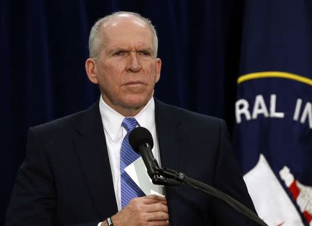 Director of the Central Intelligence Agency (CIA) John Brennan listens to questions from the press during a rare news conference at CIA Headquarters in Virginia December 11, 2014. REUTERS/Larry Downing