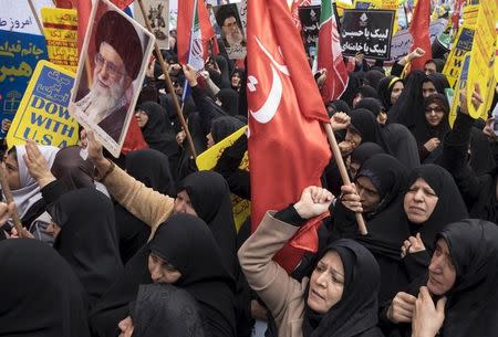 Demonstrators chant anti-U.S. slogans during a demonstration outside the former U.S. embassy in Tehran November 4, 2015. REUTERS/Raheb Homavandi/TIMA