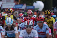 Primoz Roglic of Slovenia, top centre, celebrates after winning La Vuelta cycling race in Madrid, Spain, Sunday, Sept. 15, 2019. (AP Photo/Manu Fernandez)