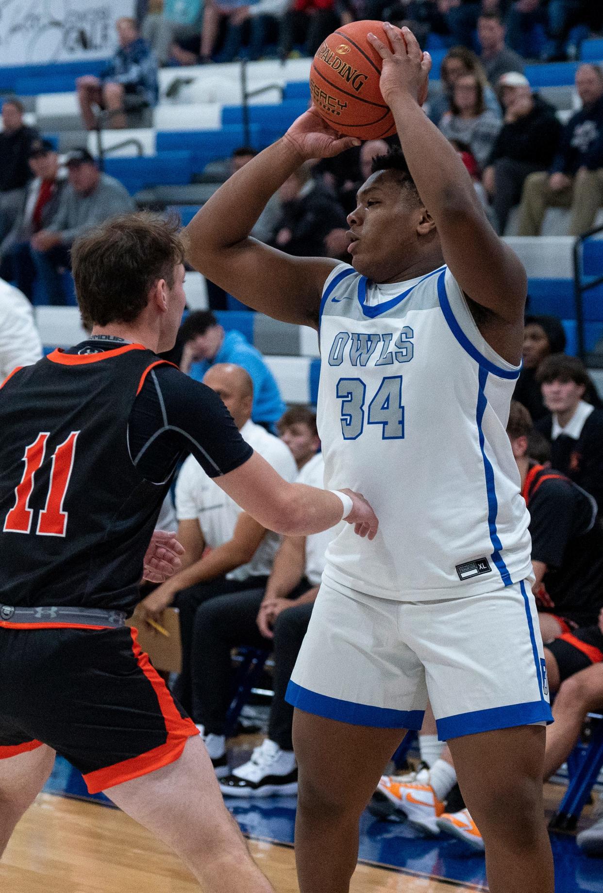 Bensalem's Jaidyn Moffitt (34) against Pennsbury's Eric David
 (11) during their boys' basketball game in Bensalem on Tuesday, Dec. 12, 2023.

Daniella Heminghaus | Bucks County Courier Times