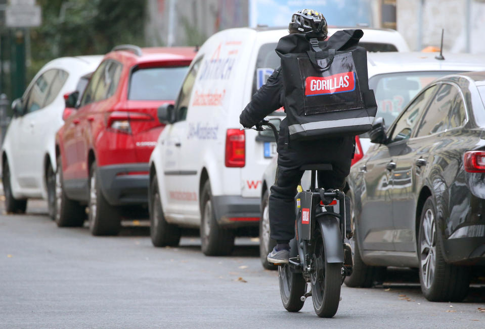 An employee of the food delivery service Gorillas cycles through the streets of Berlin. (DPA / picture alliance via Getty Images)