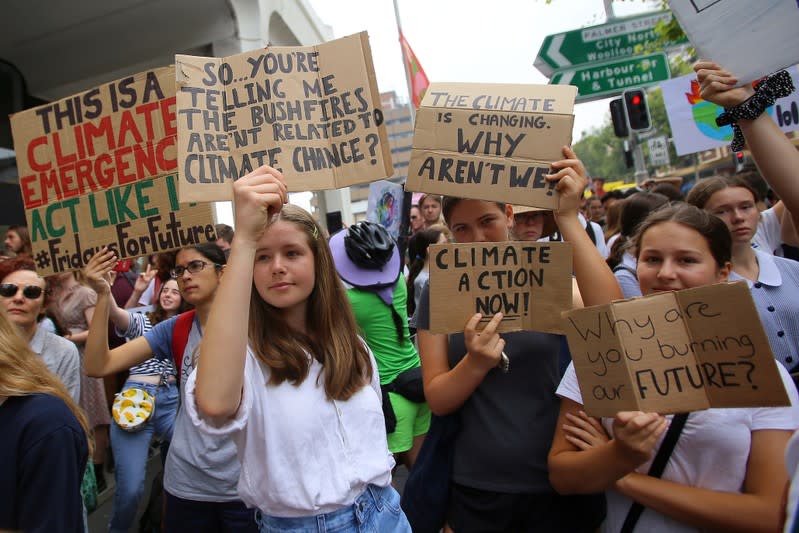 Student activists from School Strike for Climate Australia (SS4C) hold a 'Solidarity Sit-down' outside of the office of the Liberal Party of Australia in Sydney