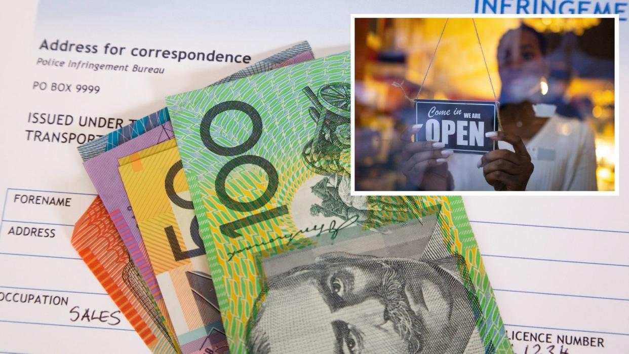 Australian fine notice with cash ntoes, image of woman flipping 'open' sign in cafe. 