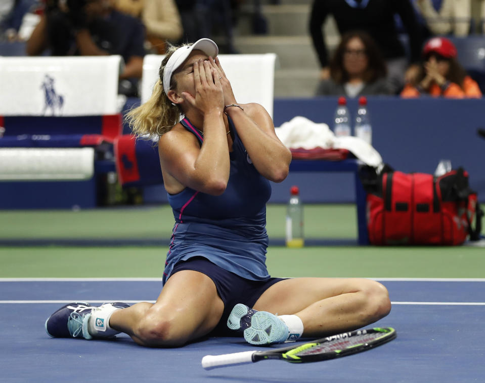 CoCo Vandeweghe celebrates after she and doubles partner Ashleigh Barty, of Australia, defeated Timea Babos, of Hungary, and Kristina Mladenovic, of France, in the women's double final of the U.S. Open tennis tournament, Sunday, Sept. 9, 2018, in New York. (AP Photo/Adam Hunger)