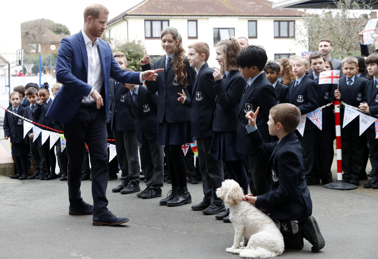 Kids from the school gathered excitedly to catch a glimpse of the famous prince, however according to the Daily Mail, when he arrived, one little boy asked him: “When is the real Prince Harry coming?” Photo: Getty Images