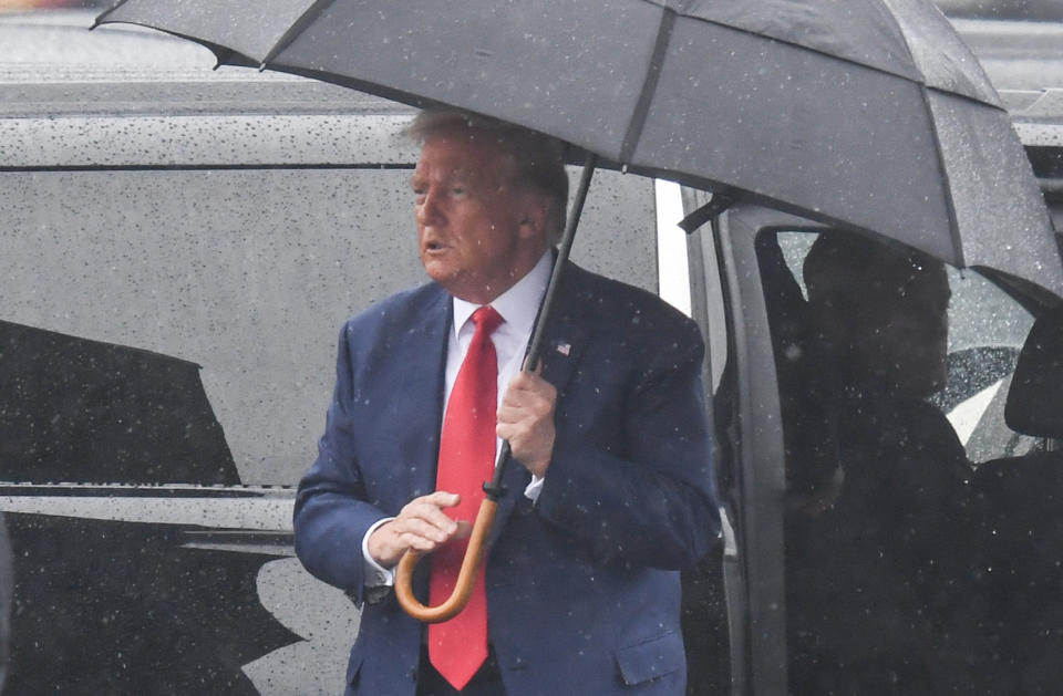 Former President Donald Trump arrives to Ronald Reagan Washington National Airport in Arlington, Virginia, on August 3, 2023, after his arraignment in court