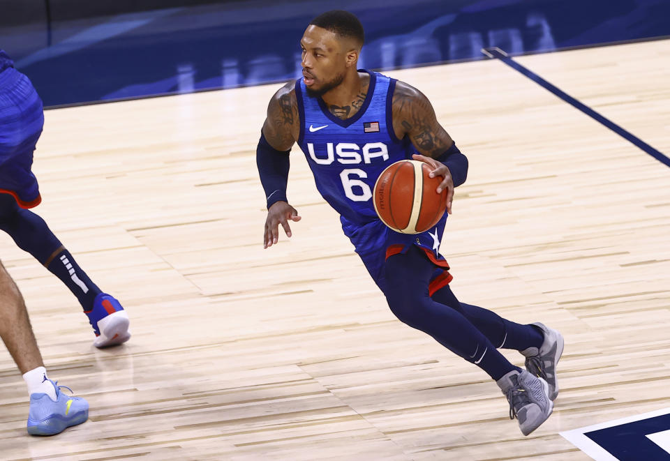 United States' Damian Lillard (6) brings the ball up court against Argentina during the first half of an exhibition basketball game in Las Vegas on Tuesday, July 13, 2021. (Chase Stevens/Las Vegas Review-Journal via AP)