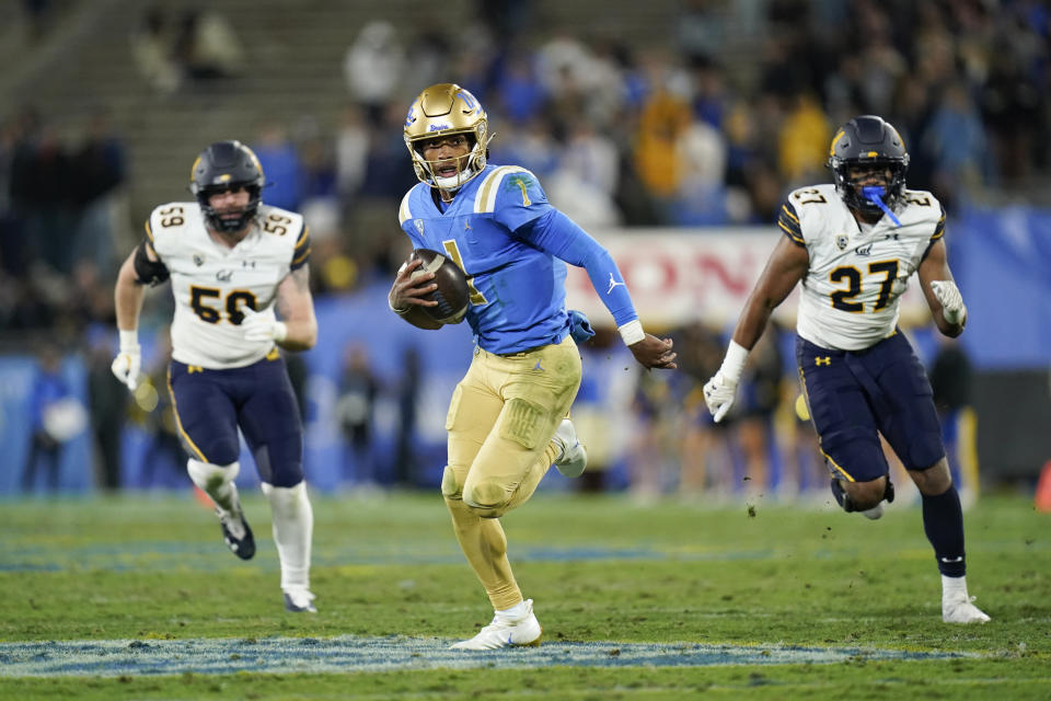 UCLA quarterback Dorian Thompson-Robinson runs with the ball during the second half of an NCAA college football game against California Saturday, Nov. 27, 2021, in Pasadena, Calif. UCLA won 42-14. (AP Photo/Jae C. Hong)