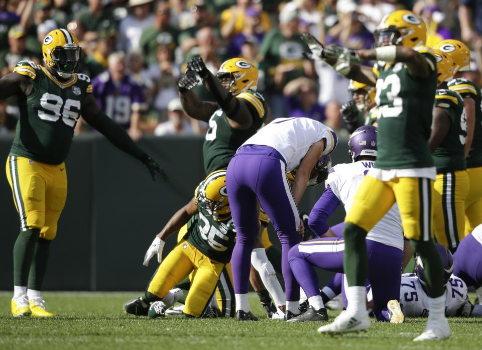 Minnesota Vikings kicker Daniel Carlson reacts after missing a field goal in the final sends of overtime an NFL football game against the Green Bay Packers Sunday, Sept. 16, 2018, in Green Bay, Wis. The game ended in a 29-29 tie. (AP Photo/Jeffrey Phelps)