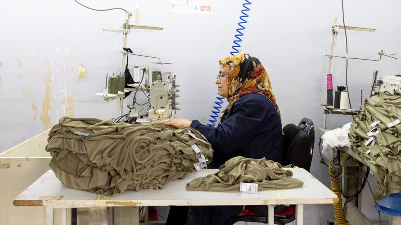 An employee works at a textile factory in Istanbul
