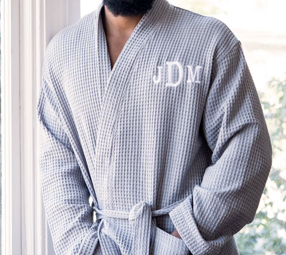 man wearing grey Personalized Men's Waffle Robe (photo via Etsy)