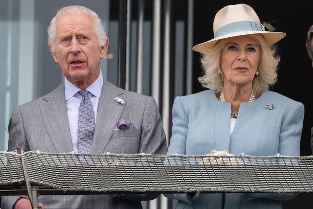 <p>Mark Cuthbert/UK Press via Getty</p> King Charles and Queen Camilla attend horse racing at Epsom Downs Racecourse on May 31, 2024