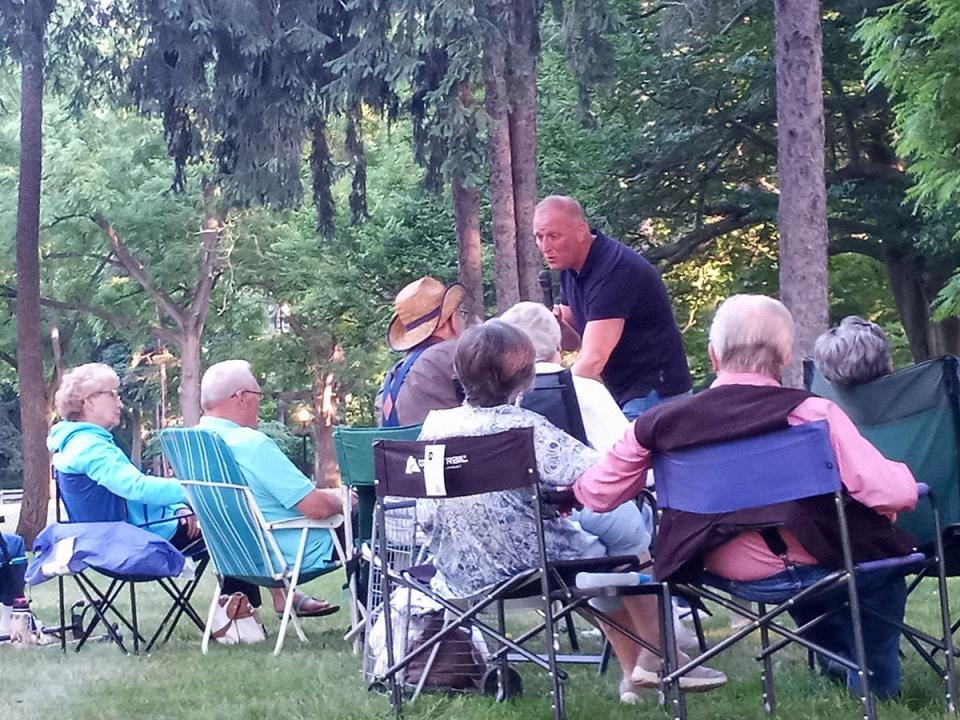 Doug Anderson engaging with a resident during Tuesday's concert.