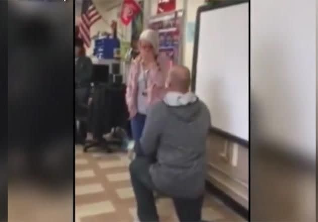 He got down on one knee and proposed to the math teacher. Photo: YouTube