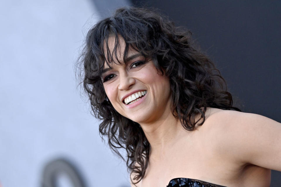 Close-up of Michelle smiling at a media event