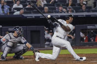 New York Yankees' Aaron Hicks fouls off a pitch during the ninth inning of the team's baseball game against the Houston Astros, Friday, June 24, 2022, in New York. (AP Photo/Bebeto Matthews)