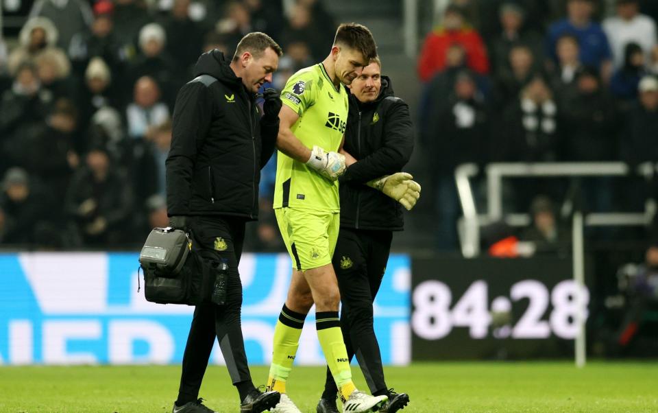 Nick Pope is helped off the field after suffering a bad shoulder injury