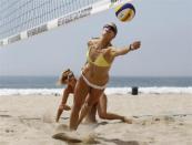 German beach volleyball players Sara Goller (R), 27, and Laura Ludwig, 26, train for the London 2012 Olympics in Manhattan Beach, California, April 9, 2012.