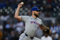 New York Mets pitcher Adrian Houser (35) works against the Atlanta Braves in the first inning of a baseball game Tuesday, April 9, 2024, in Atlanta. (AP Photo/John Bazemore)