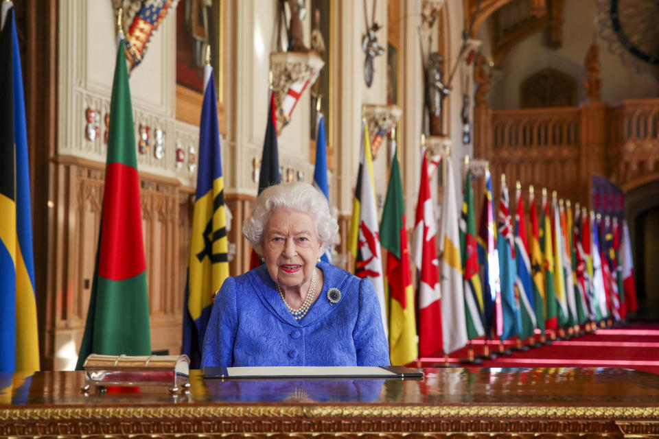 NOTE: RETRANSMITTED AMENDING EMBARGO FROM 2200HRS TO 1700HRS GMT SUNDAY MARCH 7 Embargoed to 1700hrs GMT Sunday March 7 2021 Queen Elizabeth II signs her annual Commonwealth Day Message in St George's Hall at Windsor Castle.