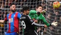 Football Soccer - Crystal Palace v Chelsea - Barclays Premier League - Selhurst Park - 3/1/16 Crystal Palace's Wayne Hennessey in action with Chelsea's Diego Costa Reuters / Dylan Martinez Livepic