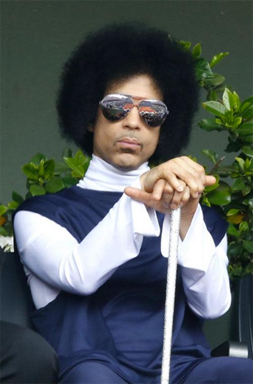 Prince? More like King. The singer looked regal as he took in the French Open, his hands leaning firmly on his very blingy cane.