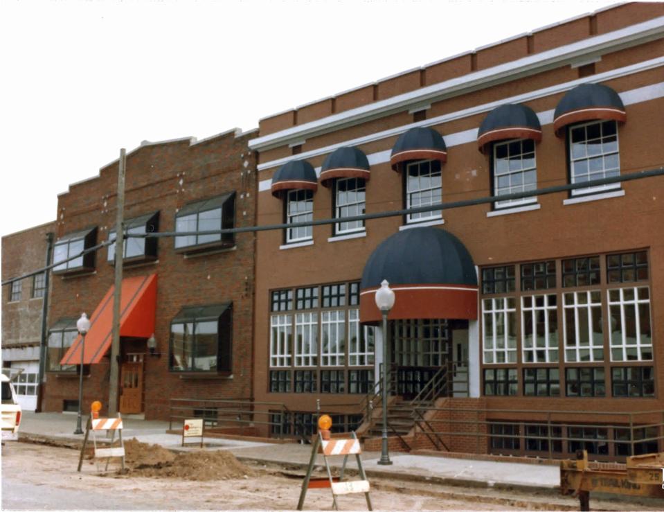 The first redevelopment in Bricktown consisted of three office buildings along Sheridan Avenue just east of what is now Mickey Mantle Drive. The development, started by the late Neal Horton, started with a florist and some offices but went bankrupt in 1983 just as renovations were being completed.