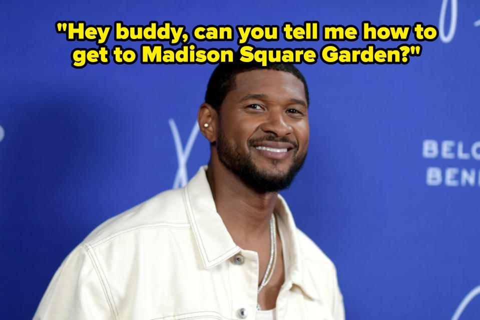 Usher smiling in a light jacket and shirt at an event