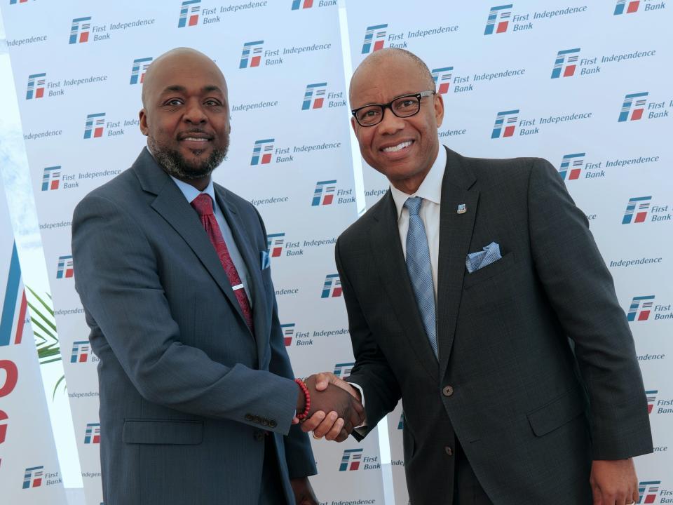 First Independence Bank CEO Kenneth Kelly (right) with Damon Jenkins, the bank's regional market president.