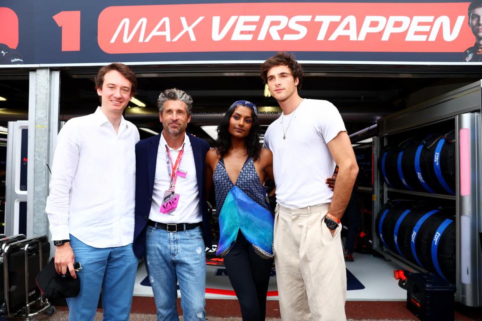 MONTE-CARLO, MONACO - MAY 29: (L-R) Frédéric Arnault, CEO of TAG Heuer, Patrick Dempsey, Simone Ashley and Jacob Elordi, pose for a photo outside the Red Bull Racing garage ahead of the F1 Grand Prix of Monaco at Circuit de Monaco on May 29, 2022 in Monte-Carlo, Monaco. (Photo by Mark Thompson/Getty Images)
