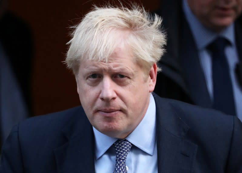 Britain's Prime Minister Boris Johnson leaves Downing Street to head for the House of Commons as parliament discusses Brexit, sitting on a Saturday for the first time since the 1982 Falklands War, in London