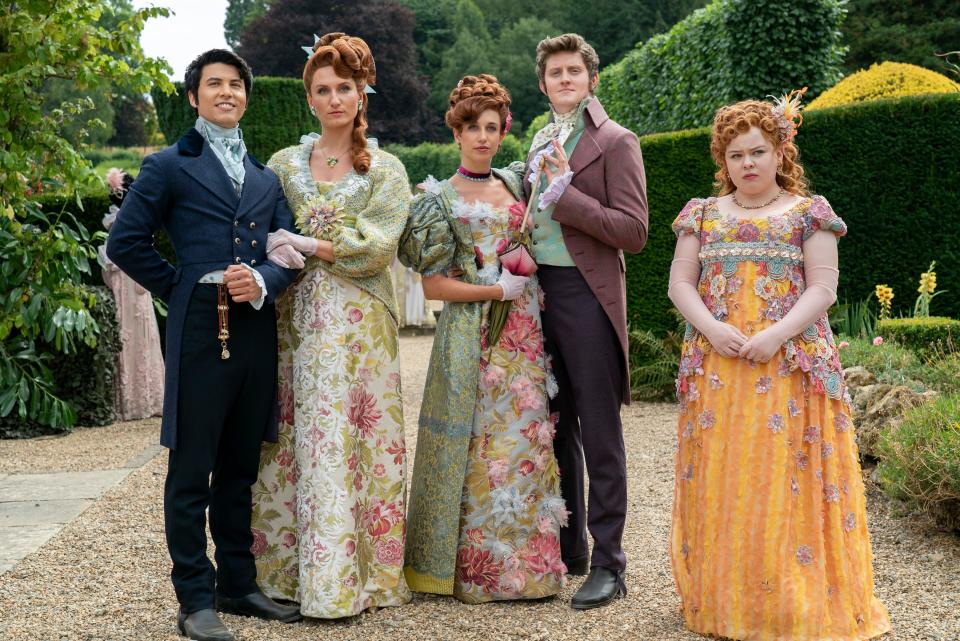 Bridgerton. (L to R) James Phoon as Harry Dankworth, Bessie Carter as Prudence Featherington, Harriet Cains as Philipa Featherington, Lorn Macdonald as Albion Finch, Nicola Coughlan as Penelope Featherington in episode 301 of Bridgerton. Cr. Liam Daniel/Netflix © 2024