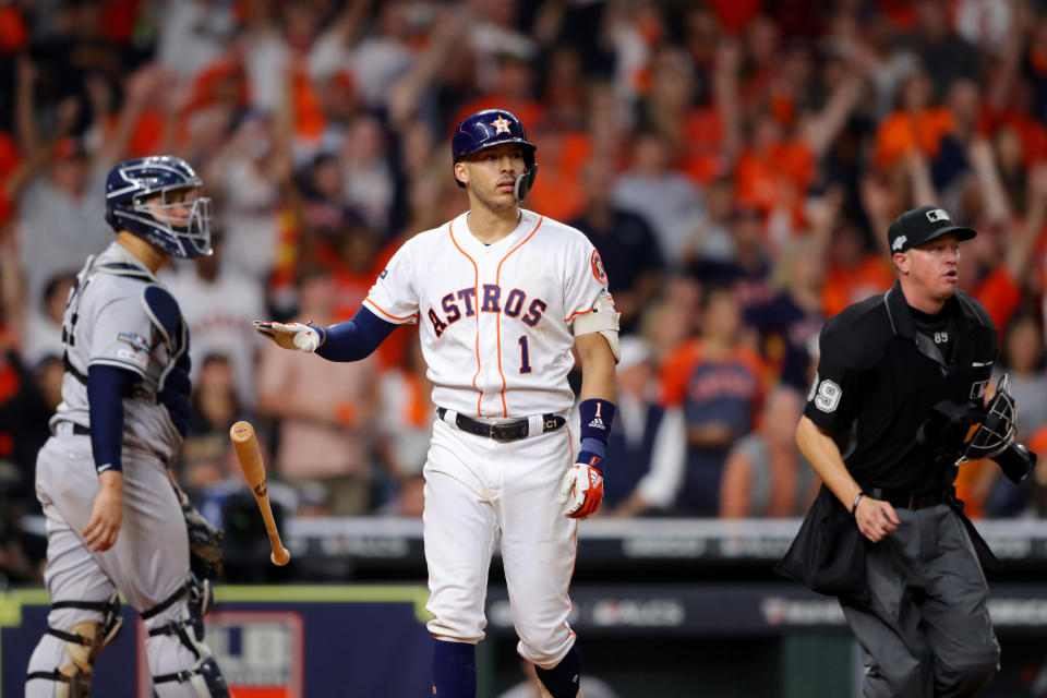 HOUSTON, TX - OCTOBER 13:  Carlos Correa #1 of the Houston Astros drops his bat after hitting a walk off home run in the 11th inning to beat the New York Yankees in Game 2 of the ALCS at Minute Maid Park on Sunday, October 13, 2019 in Houston, Texas. (Photo by Alex Trautwig/MLB Photos via Getty Images)