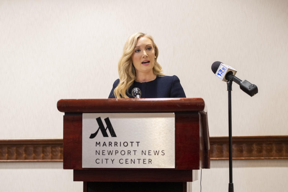 Lawyer Diane Toscano, who represents Abigail Zwerner, the Newport News teacher who was shot by a six-year-old student, reads a statement to media on Wednesday, Jan. 25, 2023, in Newport News, Va. (Mike Caudill/The Virginian-Pilot via AP)