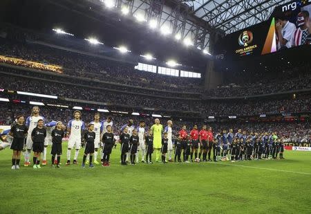 Jun 21, 2016; Houston, TX, USA; United States and Argentina players line up before a match in the semifinals of the 2016 Copa America Centenario soccer tournament at NRG Stadium. Troy Taormina-USA TODAY Sports