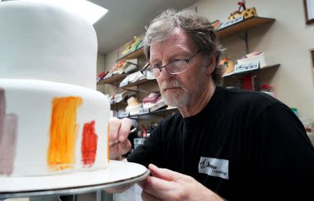 Baker Jack Phillips decorates a cake in his Masterpiece Cakeshop in Lakewood, Colorado U.S. September 21, 2017.REUTERS/Rick Wilking