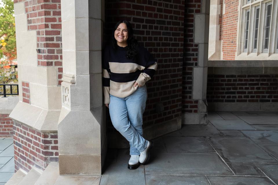 Nallely Segura, from Immokalee, on Oct. 23, 2023, stands in front of the entrance to Pomerene Hall on The Ohio State University campus. Segura is a Freshman at OSU studying Pre-Med, she is a first generation college student.