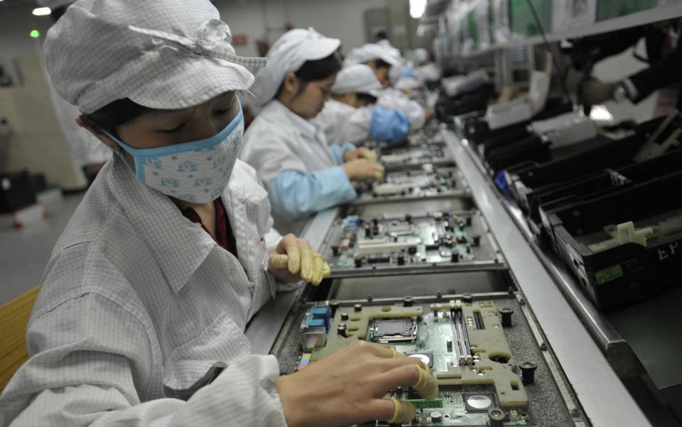 Foxconn - STR/AFP