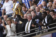 Britain Soccer Football - Hull City v Sheffield Wednesday - Sky Bet Football League Championship Play-Off Final - Wembley Stadium - 28/5/16 Hull City manager Steve Bruce lifts the trophy as they celebrate winning promotion back to the Premier League Action Images via Reuters / Tony O'Brien Livepic EDITORIAL USE ONLY. No use with unauthorized audio, video, data, fixture lists, club/league logos or "live" services. Online in-match use limited to 45 images, no video emulation. No use in betting, games or single club/league/player publications. Please contact your account representative for further details.