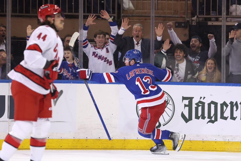 May 7, 2024; New York, New York, USA; New York Rangers left wing Alexis Lafreniere (13) celebrates his goal against the Carolina Hurricanes during the first period of game two of the second round of the 2024 Stanley Cup Playoffs at Madison Square Garden. Mandatory Credit: Brad Penner-USA TODAY Sports