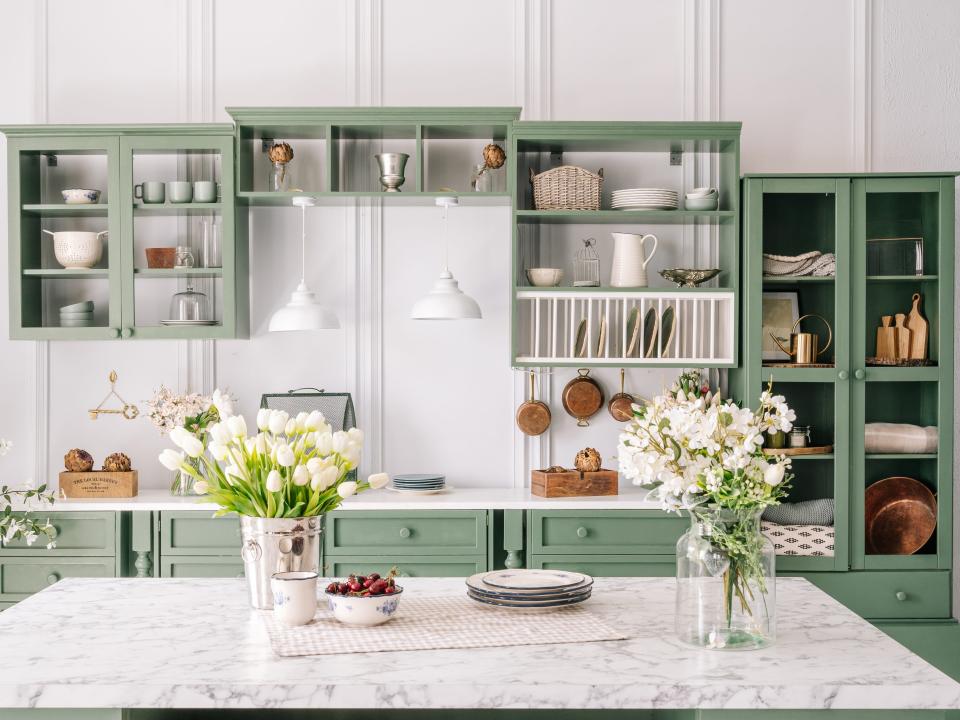 marble counter in green kitchen